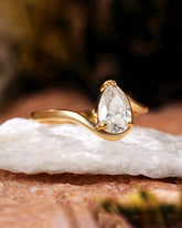 Philomela Sophisticated Bypass Claw Set Pear Solitaire Engagement Ring